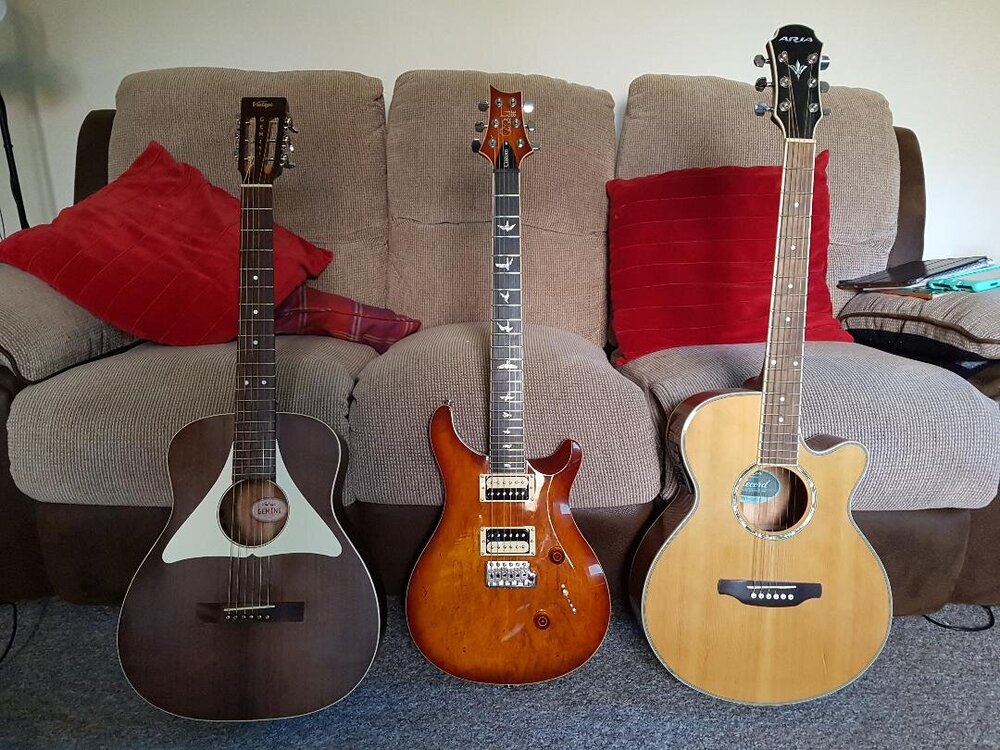 3 guitars.jpg